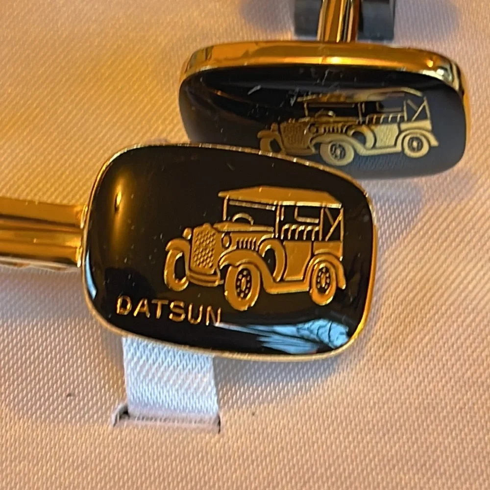 Vintage Datsun cuff links and tie clip